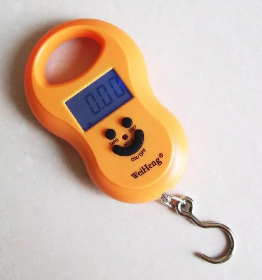 smiley-portable-luggage-scale-10g-to-50kg-–-compact-easy-grip-and-precise-display